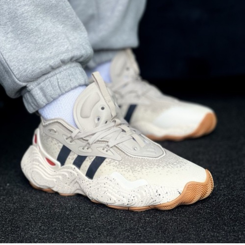 Adidas Beige and Black Sneakers with Red Accents